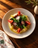 A restaurant’s own photo of its hummus, re-shot as an Instagram post in the look the owner described